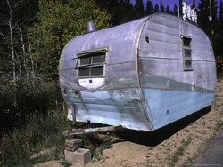 brown-michael-old-camper-at-a-car-cemetery-in-colorado.jpg